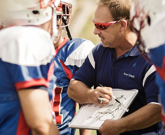 Coach Teaching Play