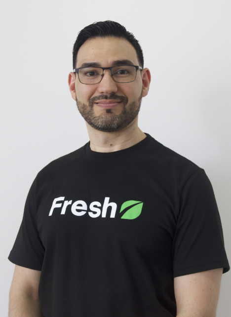 Photo of a developer wearing a Fresh t-shirt