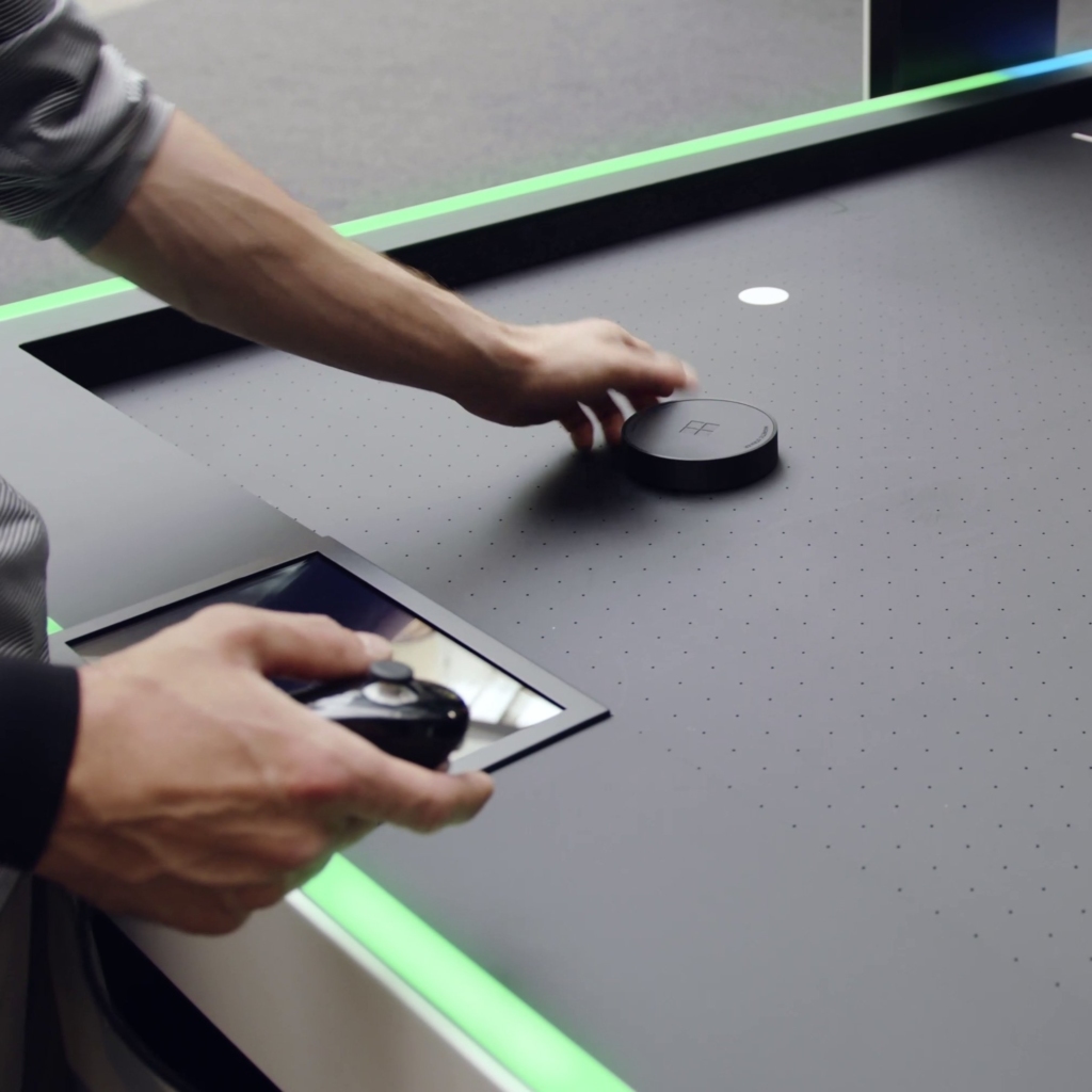 air hockey – magnetic-striker-placement